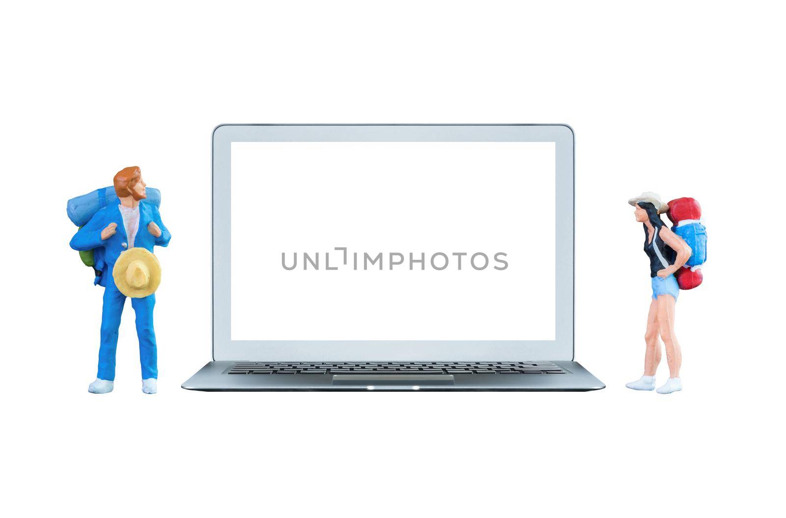 Smart laptop computer with white blank screen and miniature tourists people beside the computer.Elegant Design for mock up technology and travel concept.