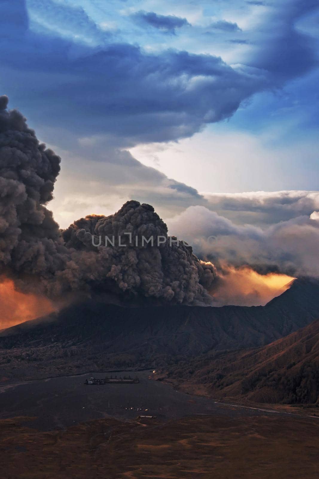 Mount Bromo volcano (Gunung Bromo) eruption during sunrise from viewpoint on Mount Penanjakan. Mount Bromo located in Bromo Tengger Semeru National Park, East Java, Indonesia.