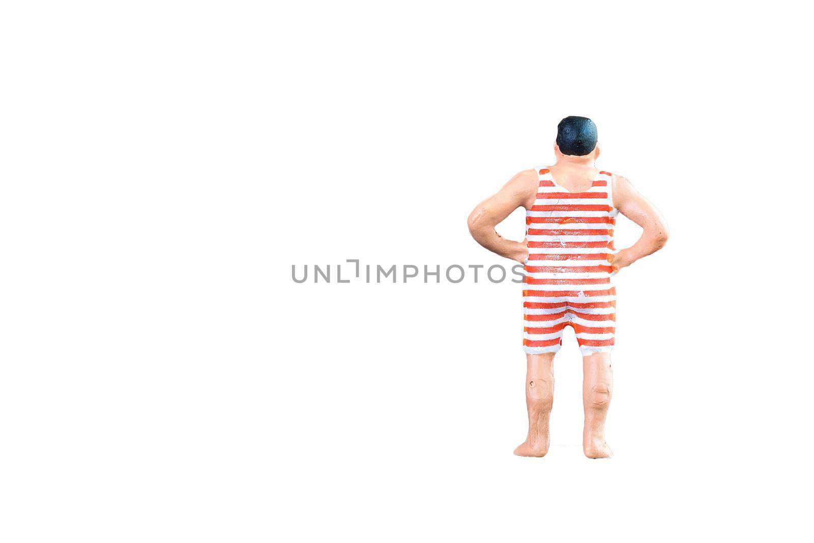 Close up of Miniature fat people isolated with clipping path on white background. Elegant Design with copy space for placement your text, mock up for travel concept. by Nuamfolio