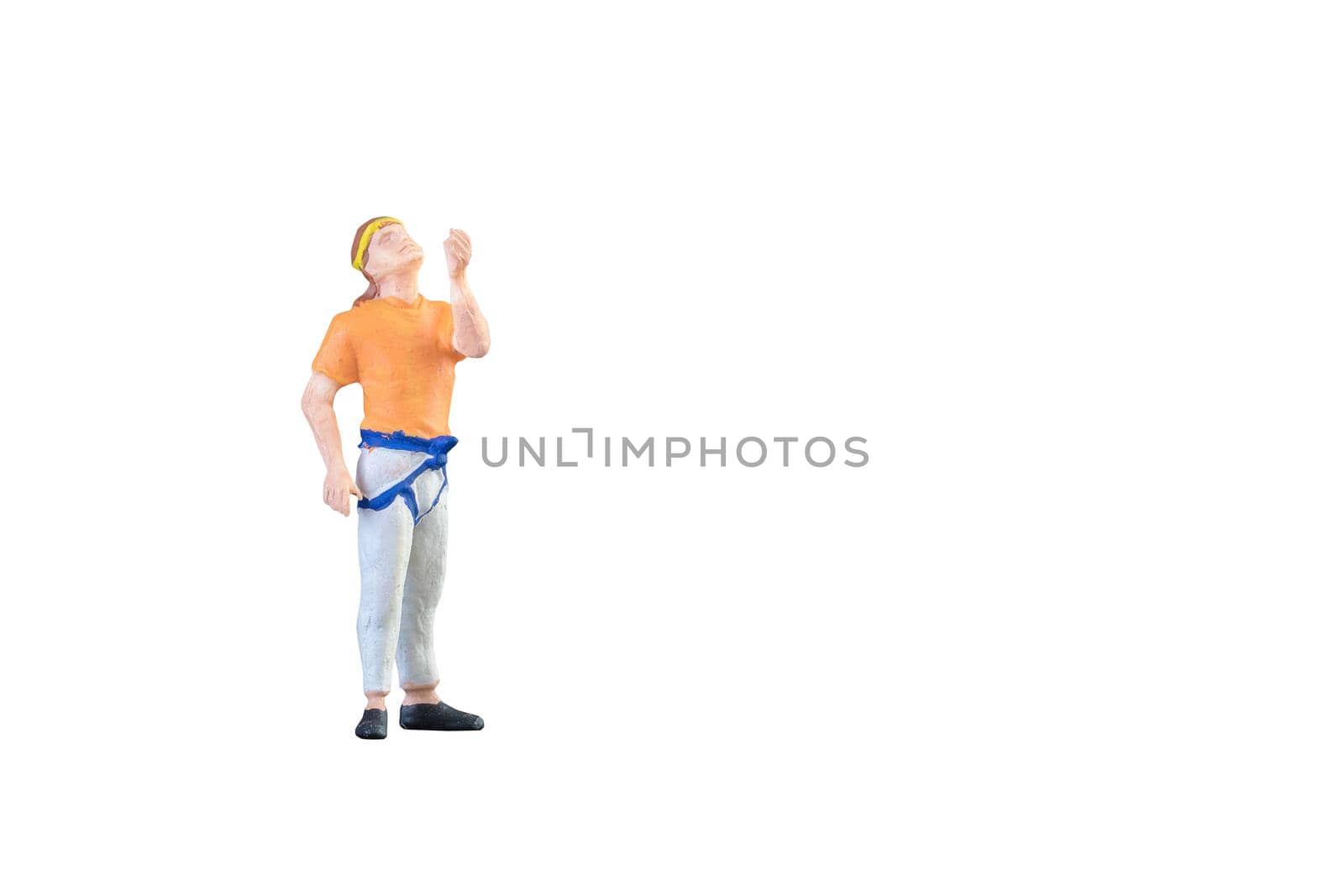 Close up of Miniature people doing climbing sport isolated with clipping path on white background.Elegant Design with copy space for placement your text, mock up for sport and heathy concept