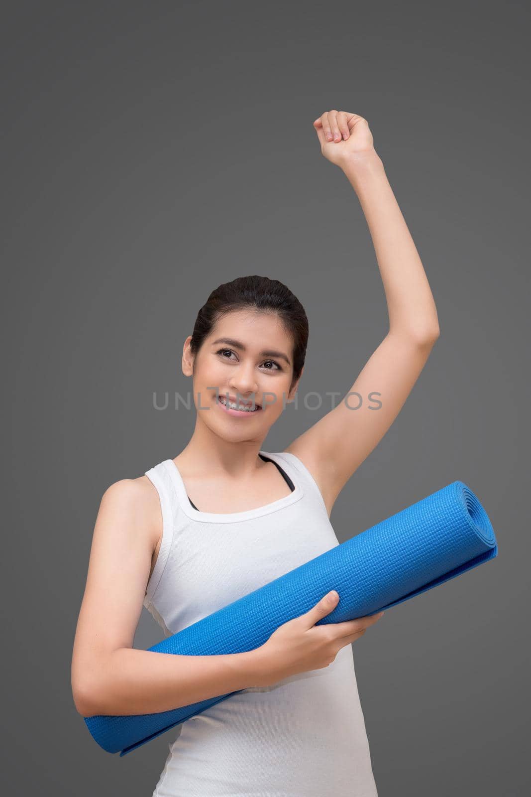 Asian healthy woman ready to exercising at sport gym, girl doing sport indoor.Photo design for fitness sporty woman and health care concept. by Nuamfolio