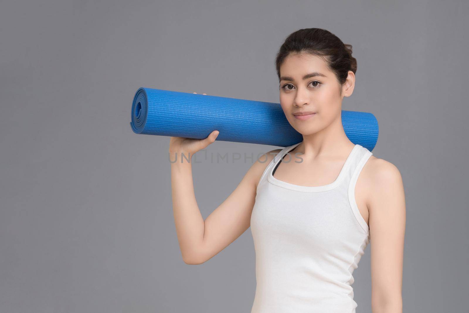 Asian healthy woman ready to exercising at sport gym, girl doing sport indoor.Photo design for fitness sporty woman and health care concept. by Nuamfolio