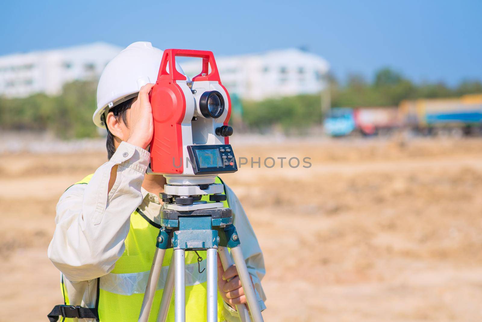 Asian construction engineer checking construction site for new Infrastructure project. photo concept for engineering work.