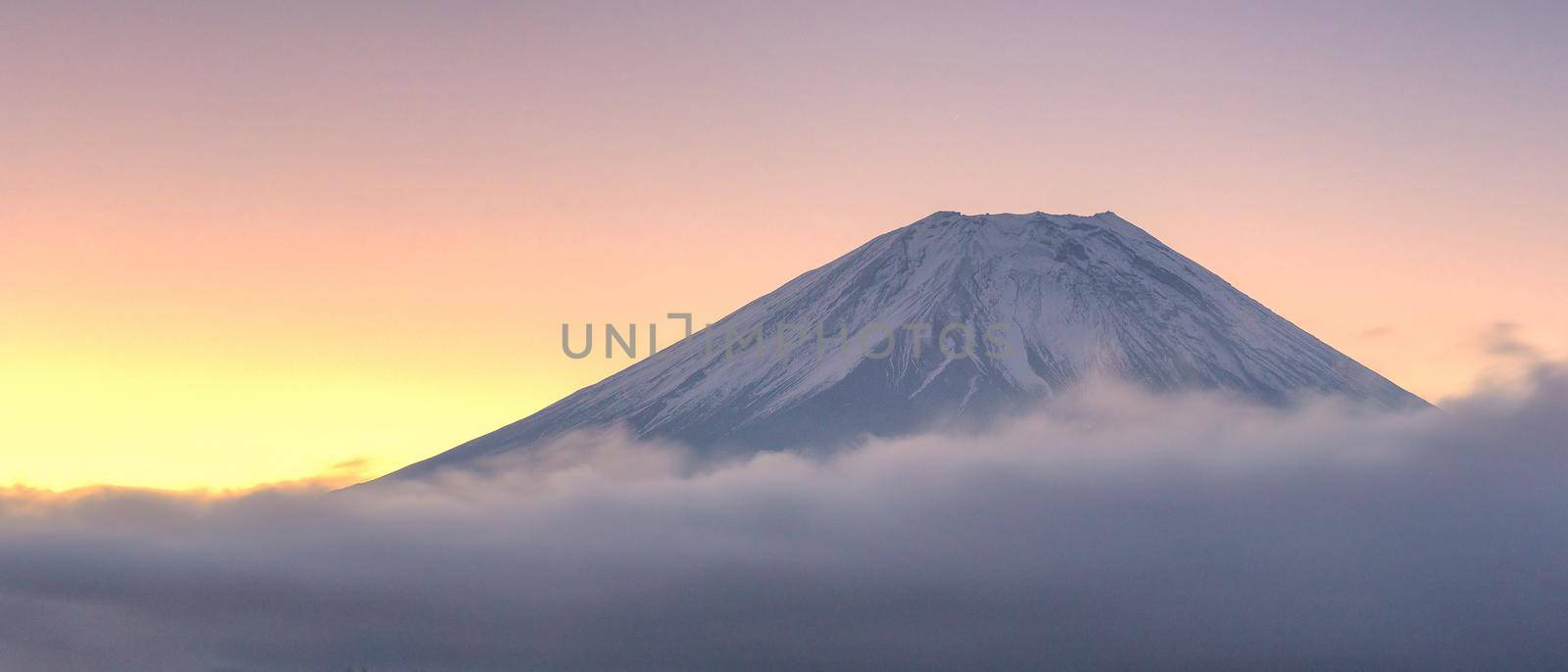 Panorama beautiful natural landscape view of Mount Fuji during sunrise in winter season at Japan. by Nuamfolio