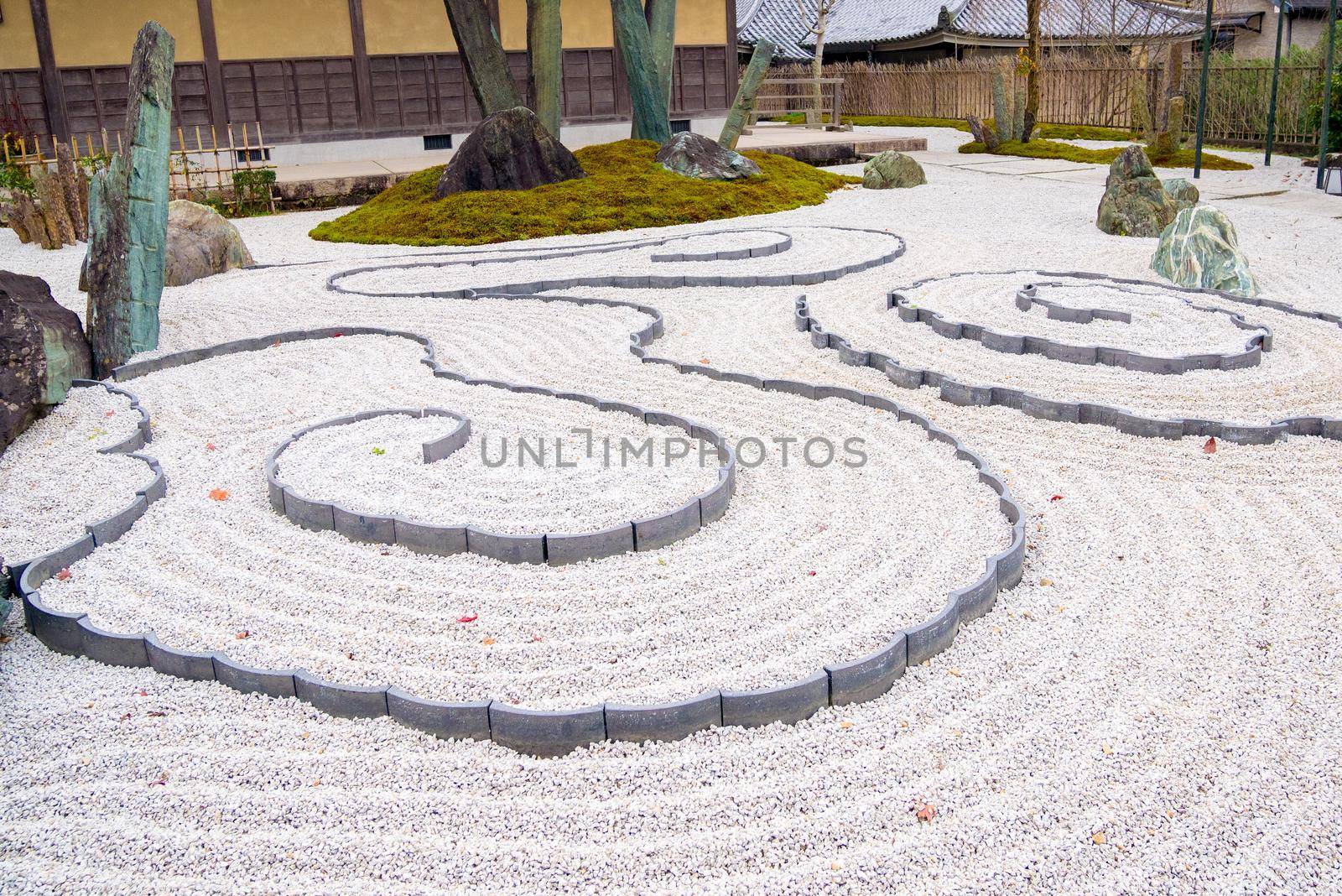 Japanese ZEN garden zen garden meditation stone in lines sand for relaxation balance and harmony spirituality or wellness in Kyoto,Japan