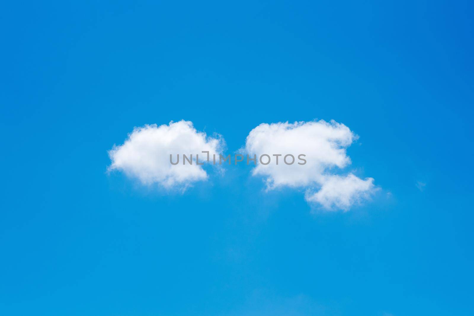 minimal nature white cloud on blue sky background in daytime, photo of nature cloud for freedom and nature concept. by Nuamfolio