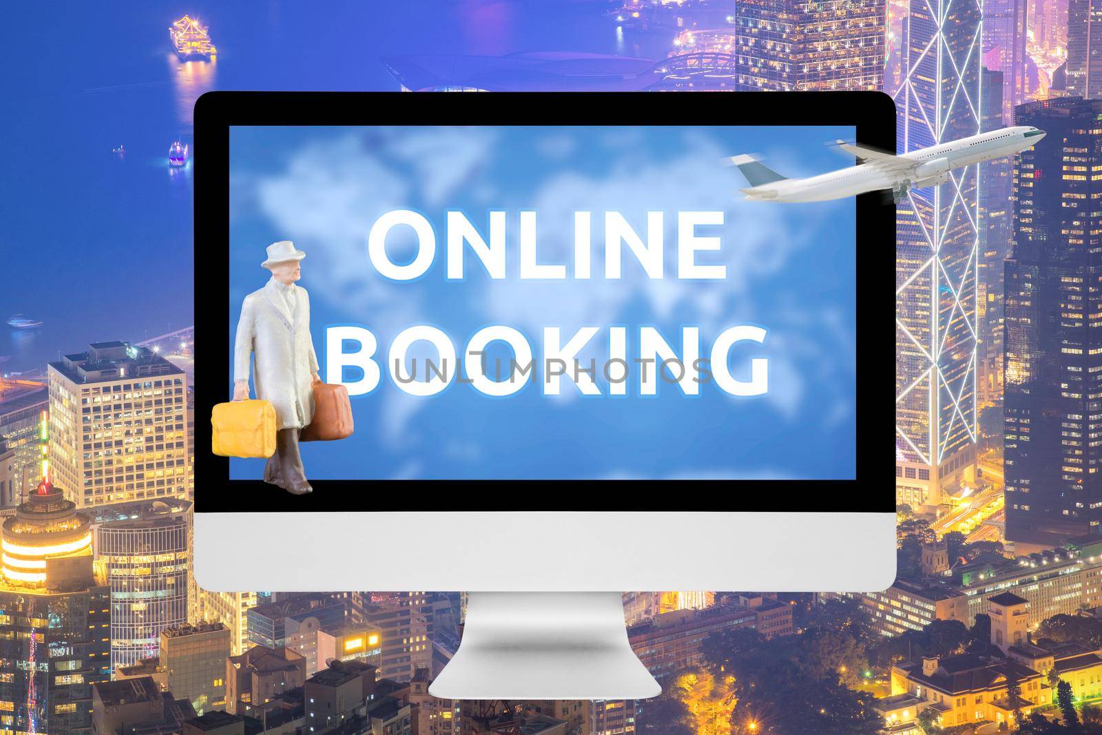 Laptop showing online booking on screen with Commercial airplane flying over big city in background. Elegant Design with copy space for business tansportation and travel concept.