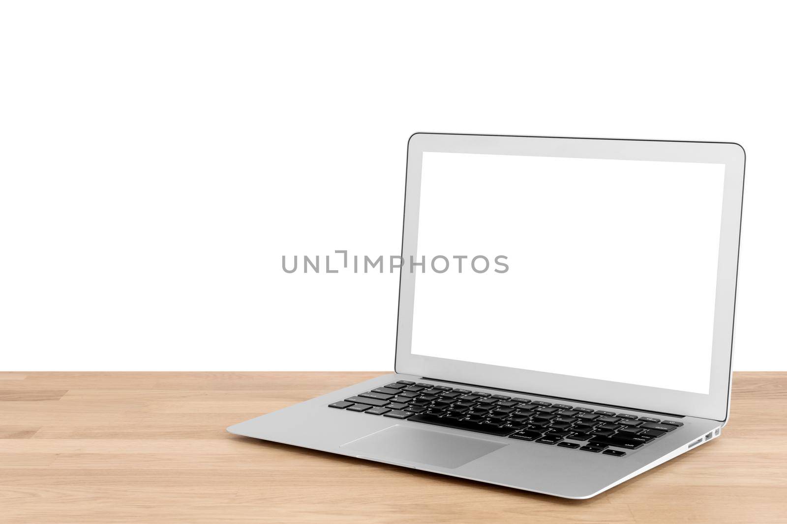 Smart laptop with blank white screen on wooden table with white background.Photo design for smart technology and internet of things concept.