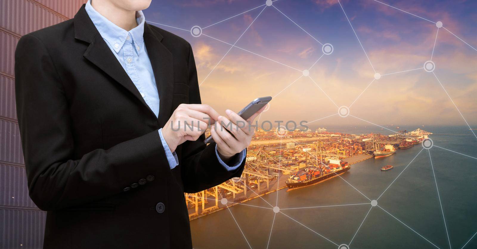 Smart Business woman use smartphone and internet of things technology for Global business connection with global customer for worldwide transportation business.