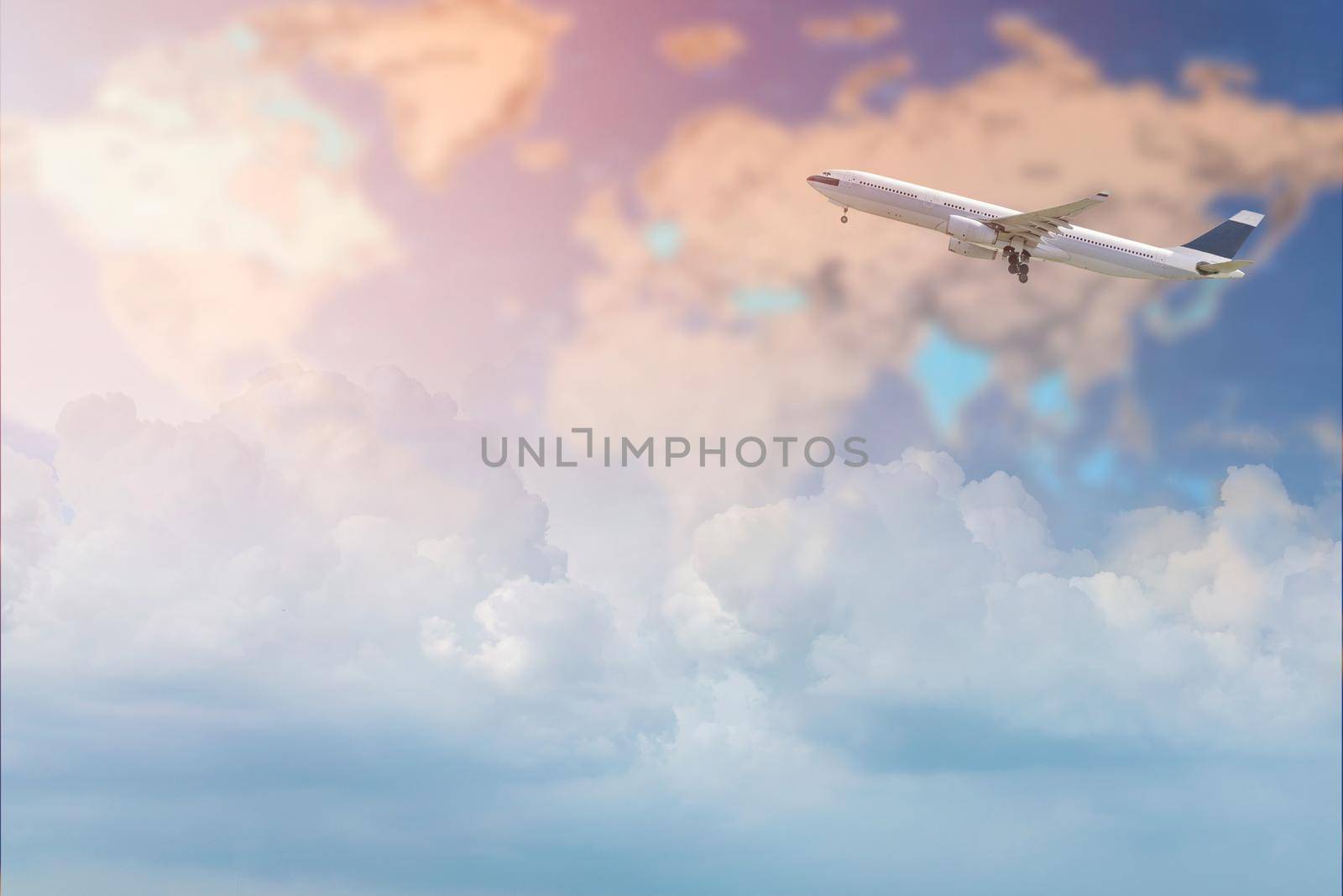 Commercial airplane flying over white clouds sky and world map. Elegant Design with copy space for travel concept.