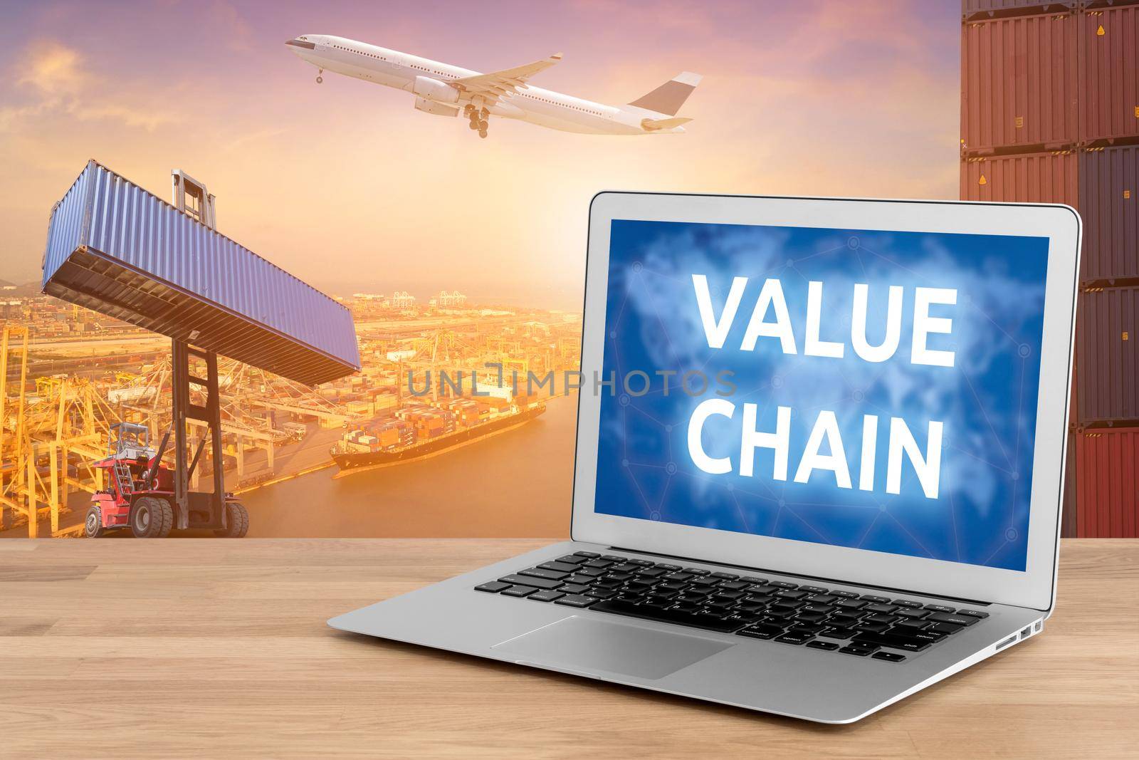 Laptop showing business value chain and internet of things technology concept for Global business connection to customer for worldwide container cargo shipping with logistic concept background by Nuamfolio