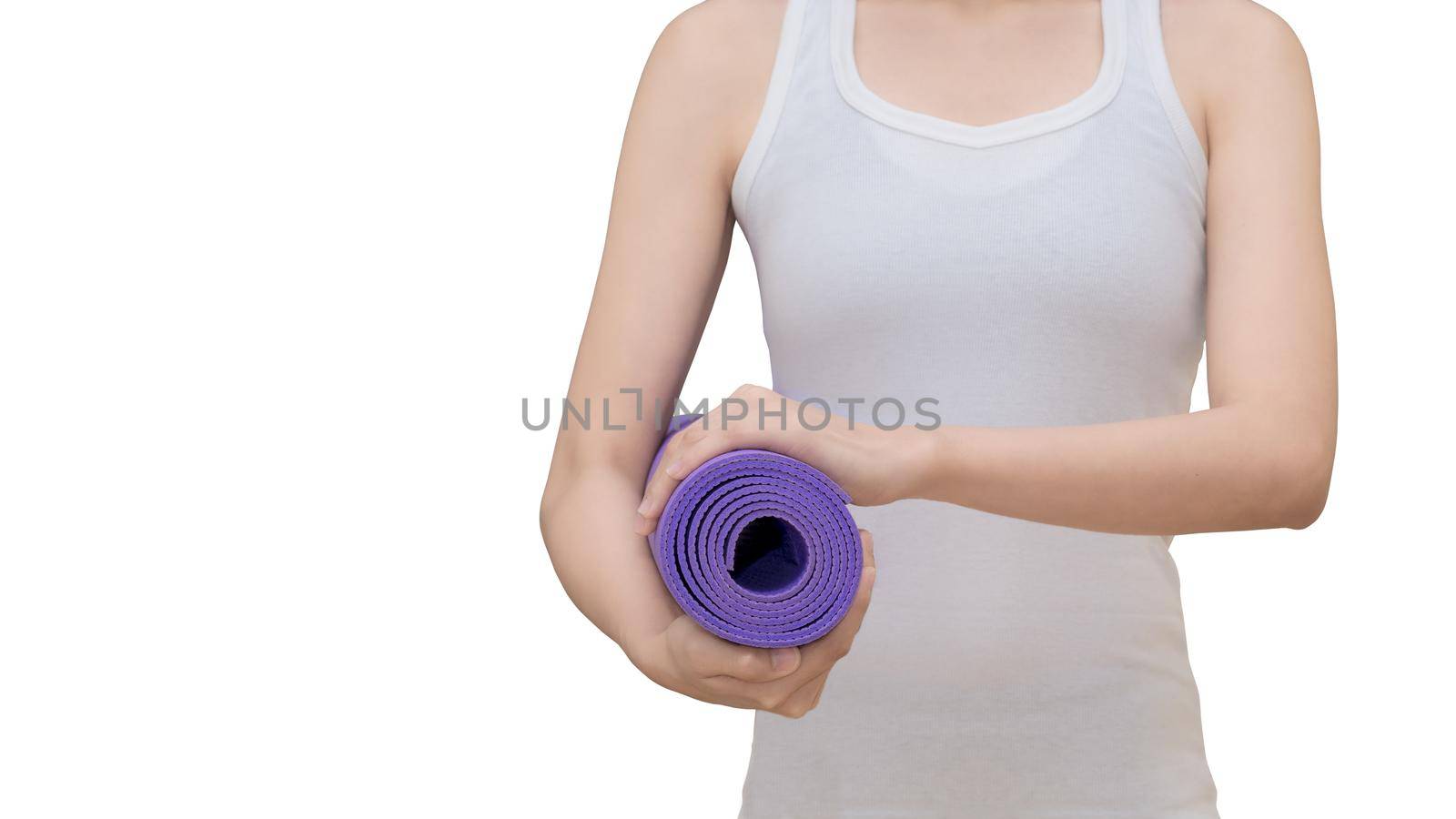 Young asian woman holding her yoga mat isolated on white background with with clipping path. Yoga and meditation have good benefits for health. Photo concept for Yoga Sport and Healthy lifestyle