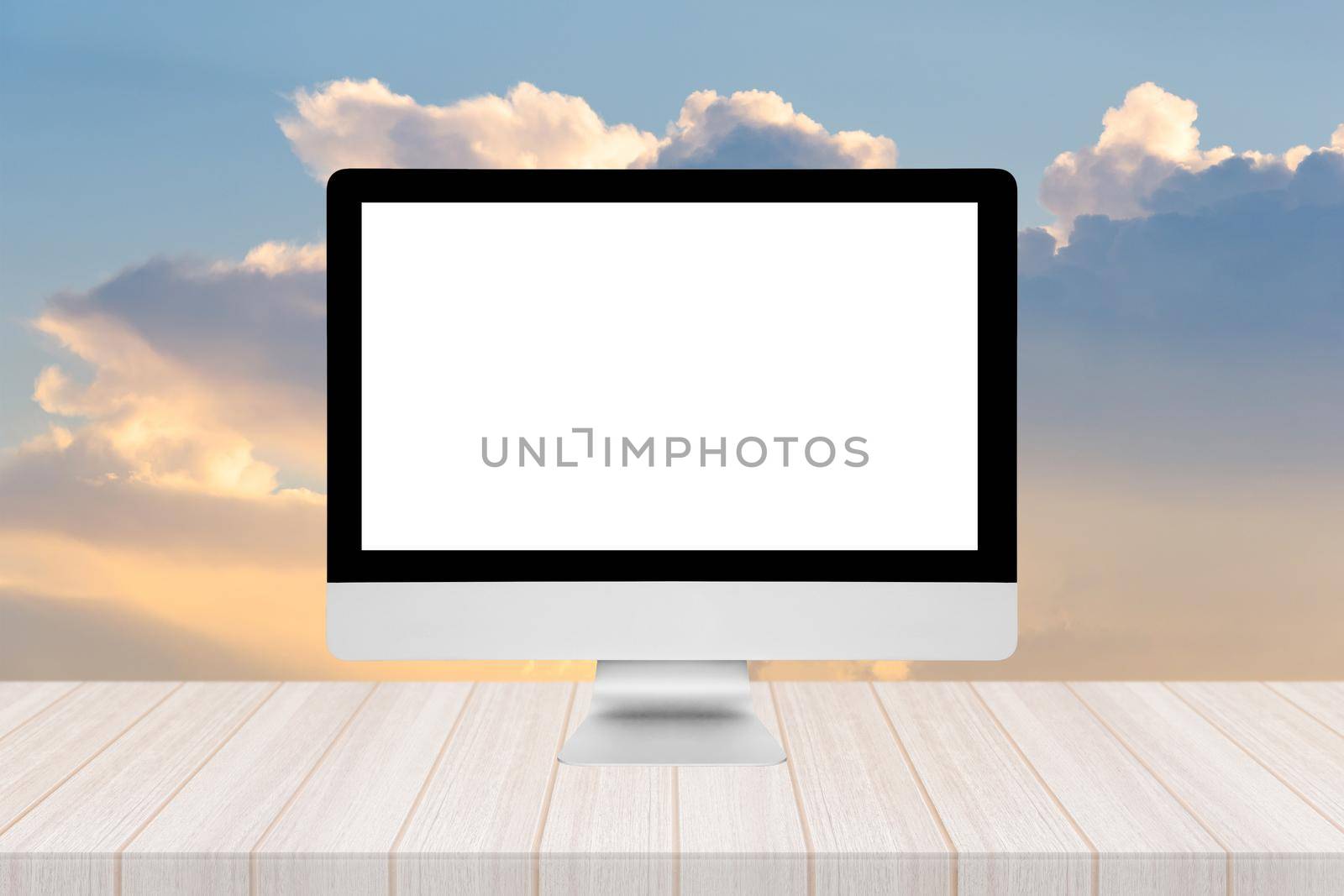Smart modern PC with blank screen on nature sky background on wooden table.Photo design for cloud computing and smart technology internet of things concept by Nuamfolio