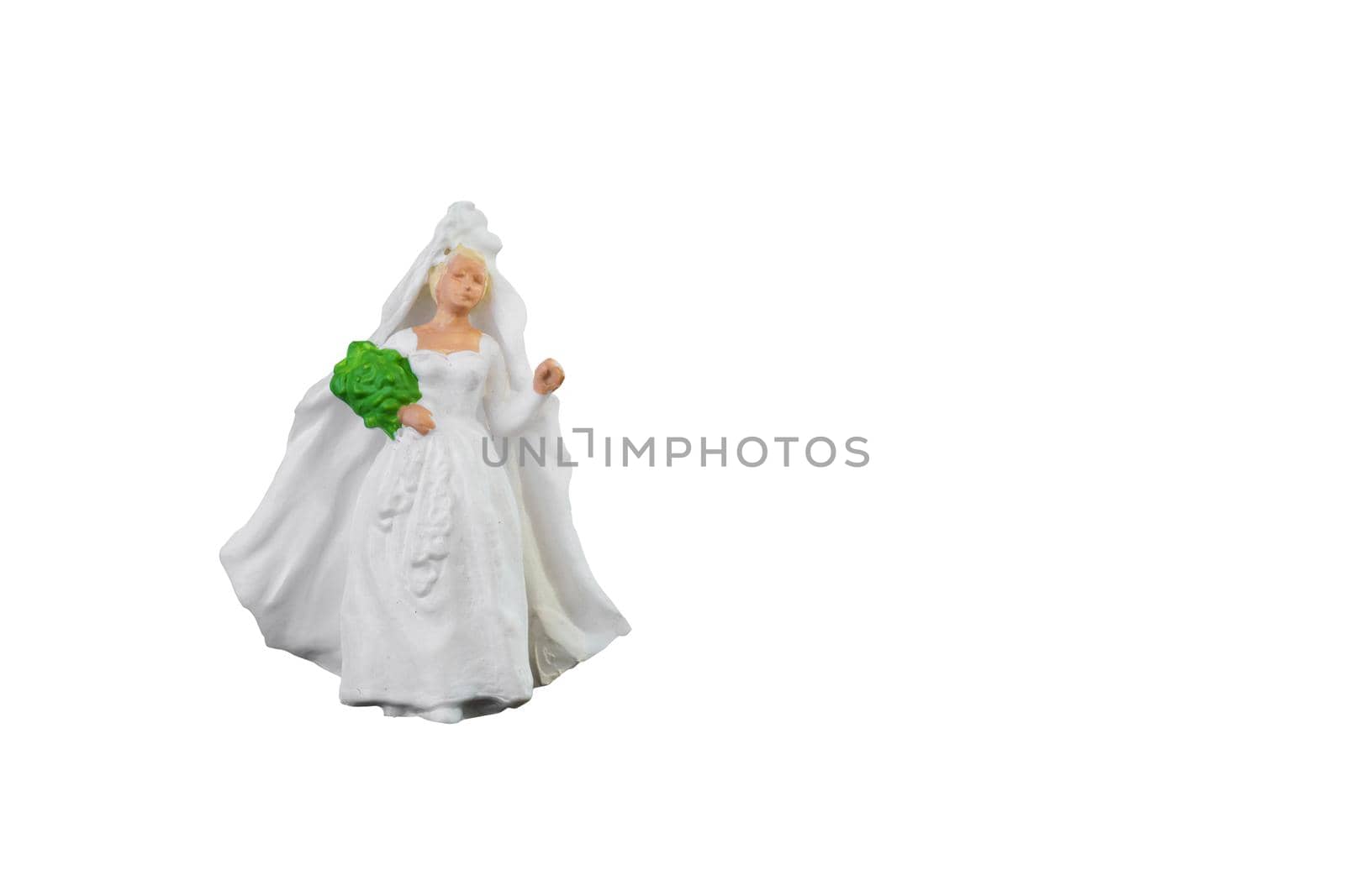 Close up of Miniature people wedding bride isolated with clipping path on white background.Elegant Design with copy space for placement your text, mock up for love and wedding concept by Nuamfolio