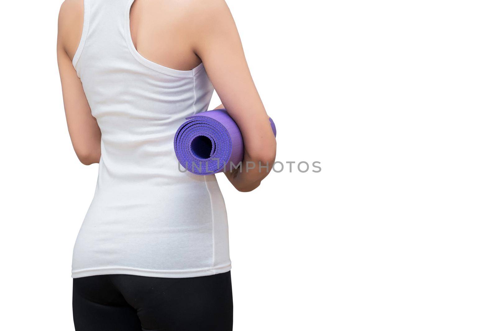 Young asian woman holding her yoga mat isolated on white background with clipping path. Yoga and meditation have good benefits for health. Photo concept for Yoga Sport and Healthy lifestyle