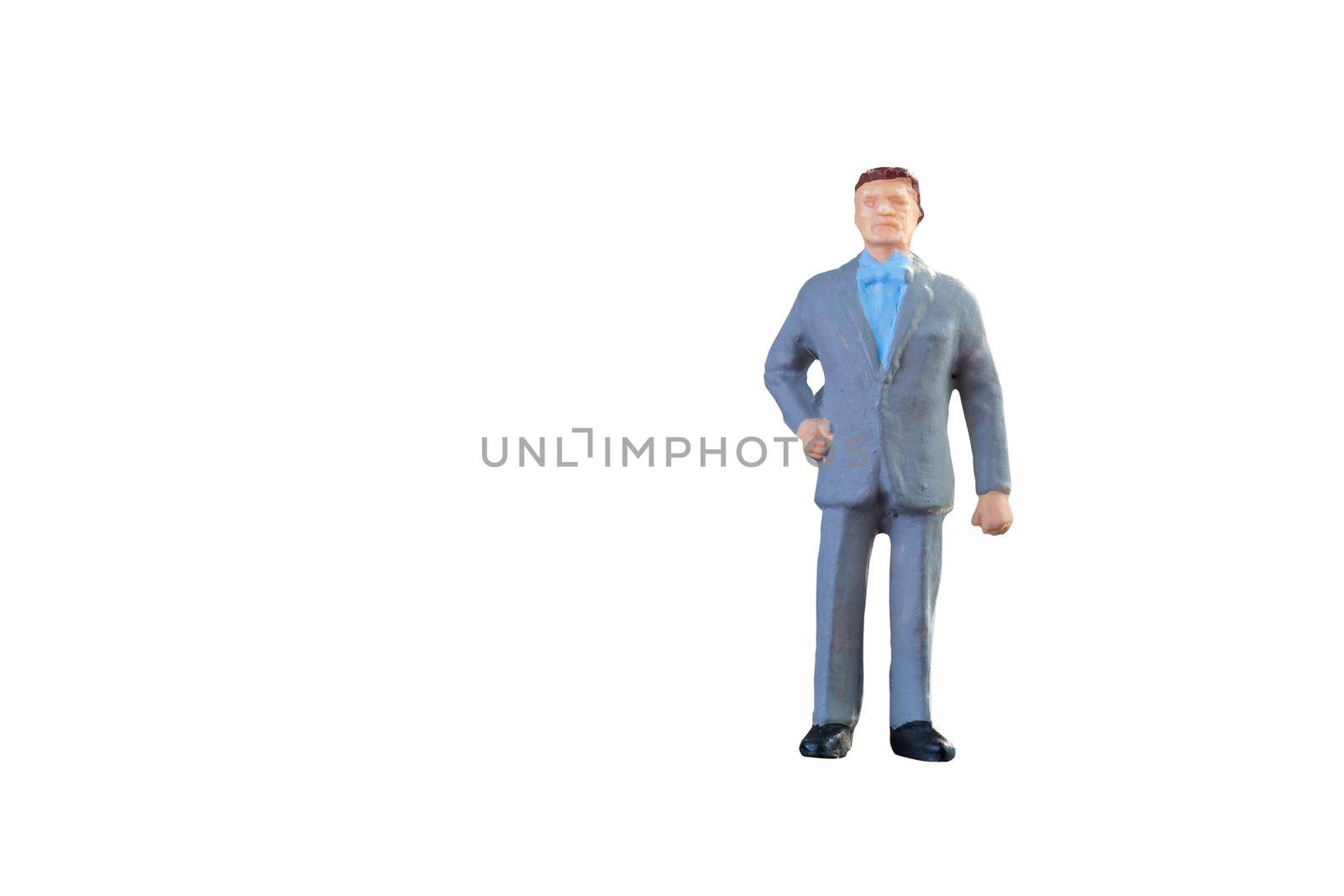 Close up of Miniature businessman and tourist people isolated with clipping paht on white background.Elegant Design with copy space for placement your text, mock up for business and travel concept