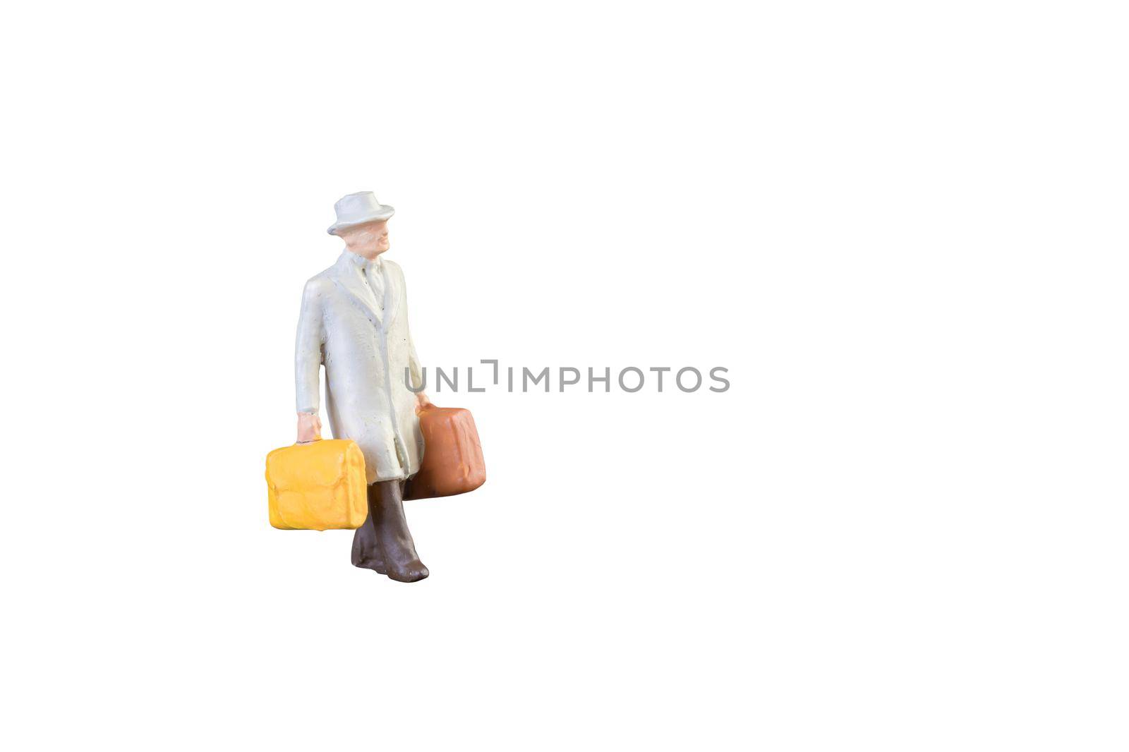 Close up of Miniature businessman and tourist people isolated with clipping path on white background.Elegant Design with copy space for placement your text, mock up for business and travel concept by Nuamfolio