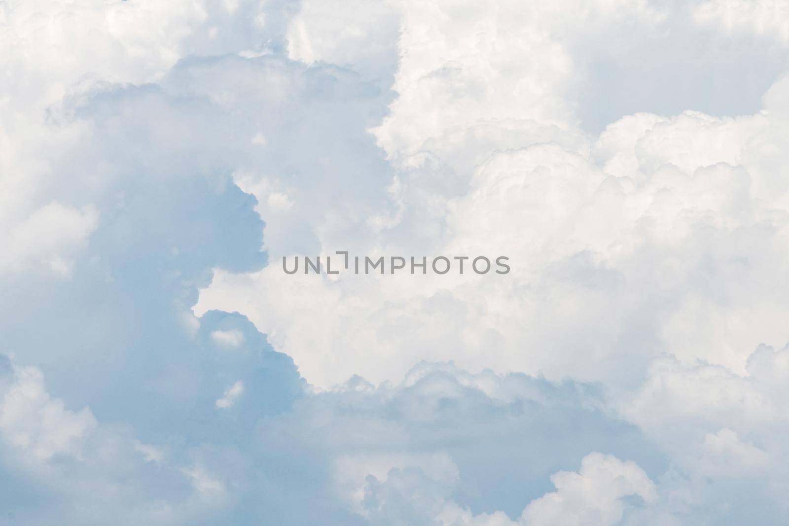Nature white cloud on blue sky background in daytime, photo of nature cloud for freedom and nature concept by Nuamfolio