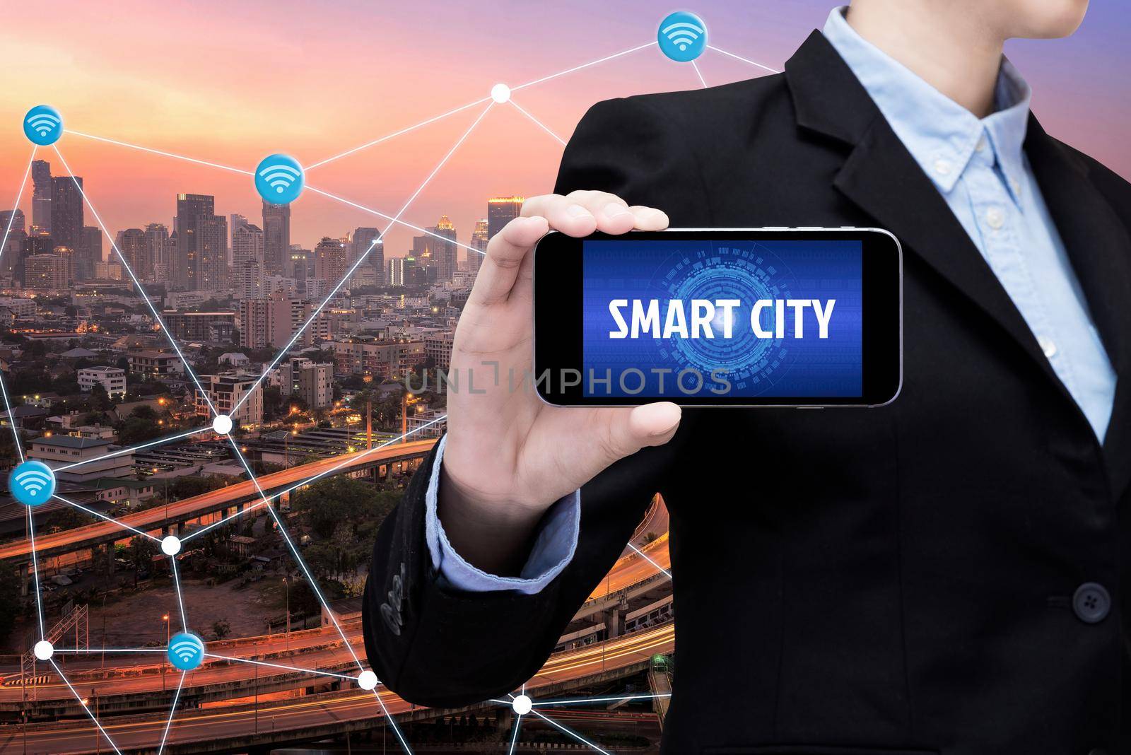 Young Smart business woman is using smart technology of internet of things in smart city for global business connection. Photo design for smart city and smart technology internet of things concept