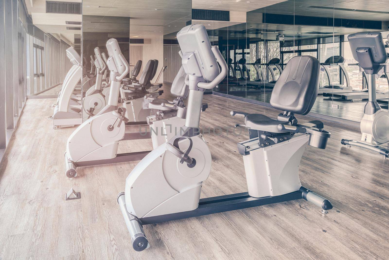 Fitness gym with the modern sport equipment. Fitness gym is a modern lifestyle for sport workout  by Nuamfolio
