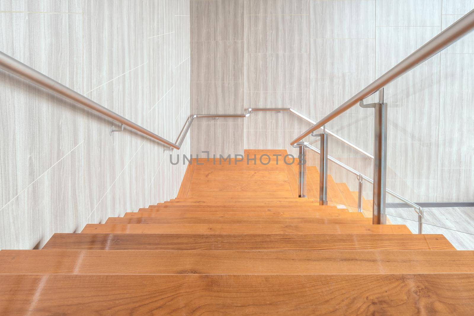 Modern space of wooden stairs interior design in modern building  by Nuamfolio