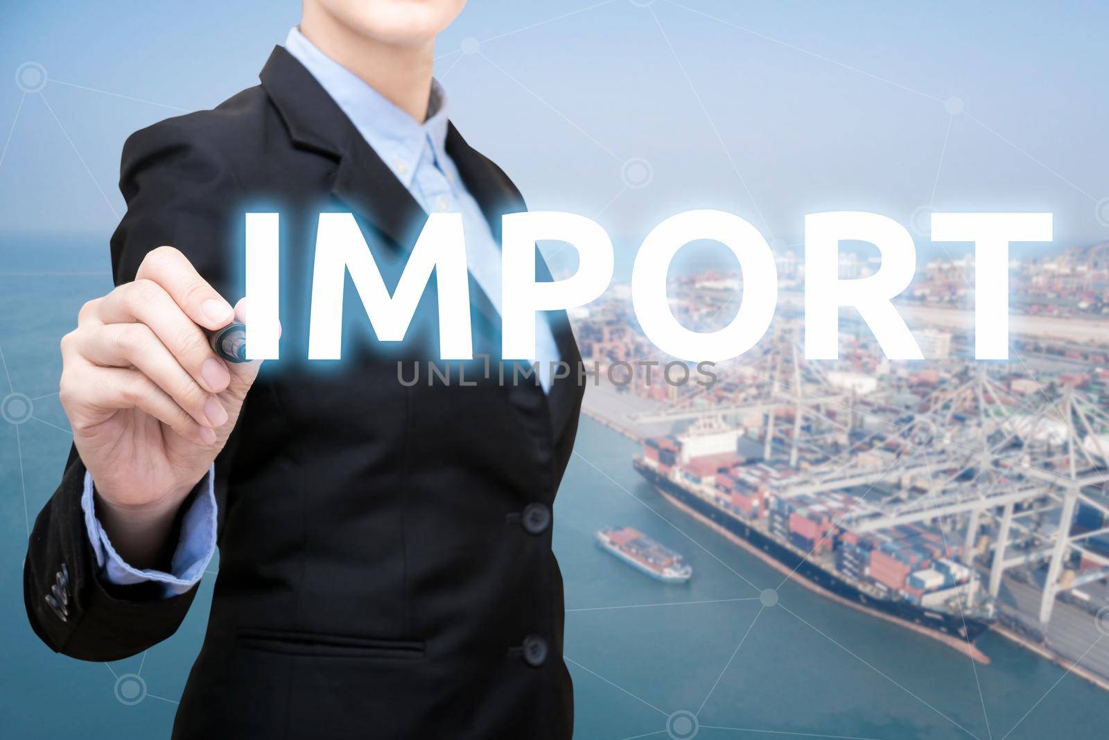 Smart Business woman is writing import concept with shipping boat at shipping yard in background for Global business container cargo shipping,Logistic,Import  and Export business concept