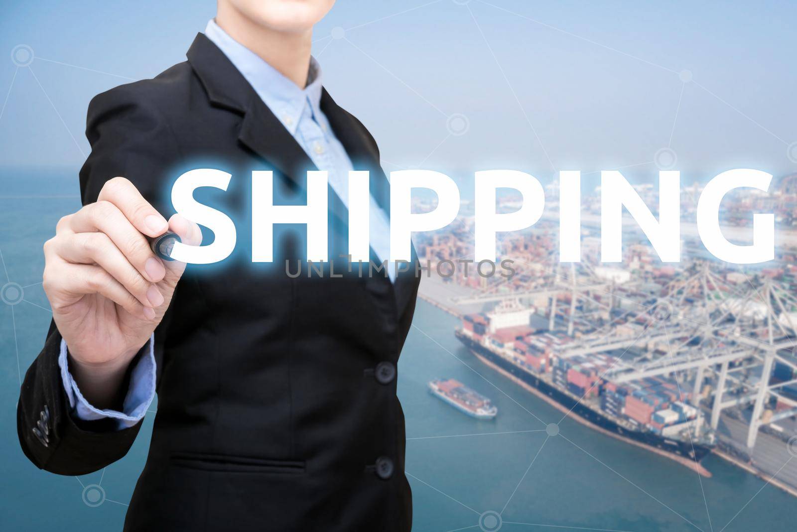 Smart Business woman is writing shipping concept with shipping boat at shipping yard in background for Global business container cargo shipping,Logistic,Import and Export business concept. by Nuamfolio