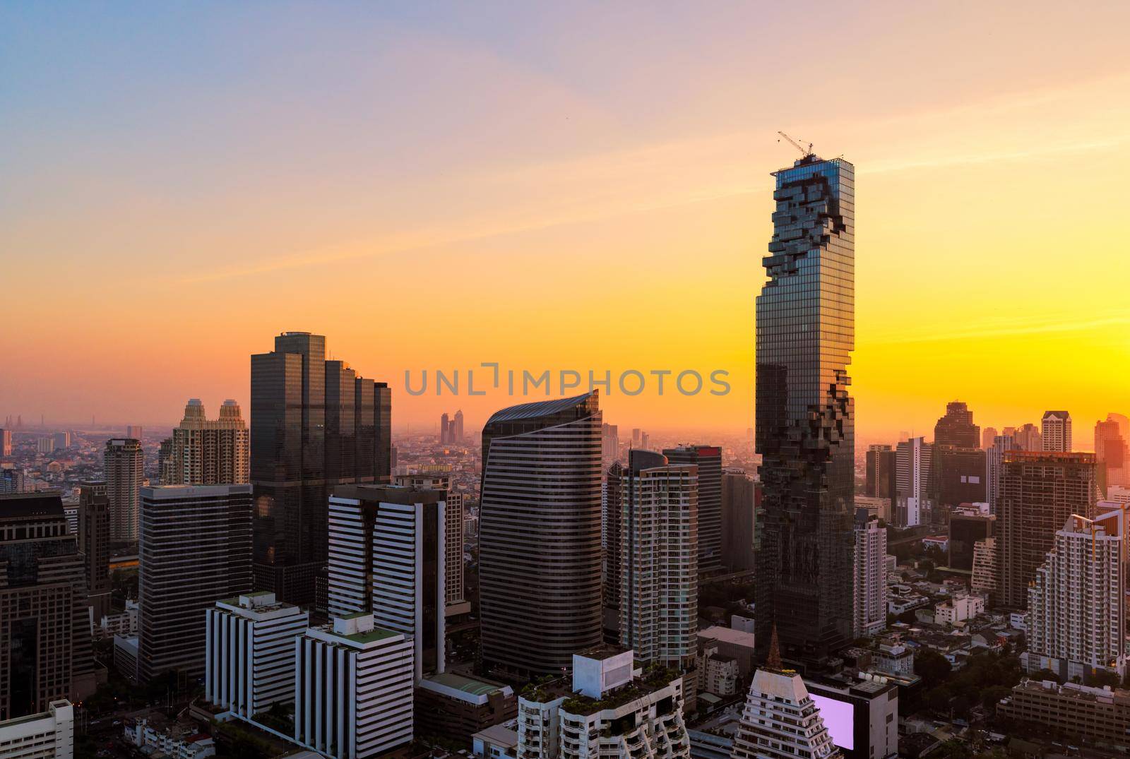 Cityscape view of Bangkok modern office business building in business zone at Bangkok, Thailand. Bangkok is the capital and most populous city of Thailand and most populated city in Southeast Asia. by Nuamfolio