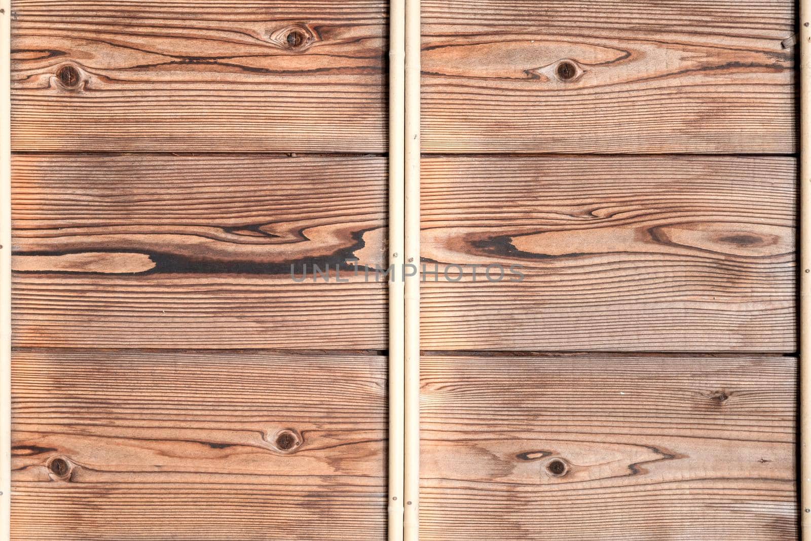 Wodden pattern of classic wood plank wall texture background. Retro decoration material for classical building  by Nuamfolio