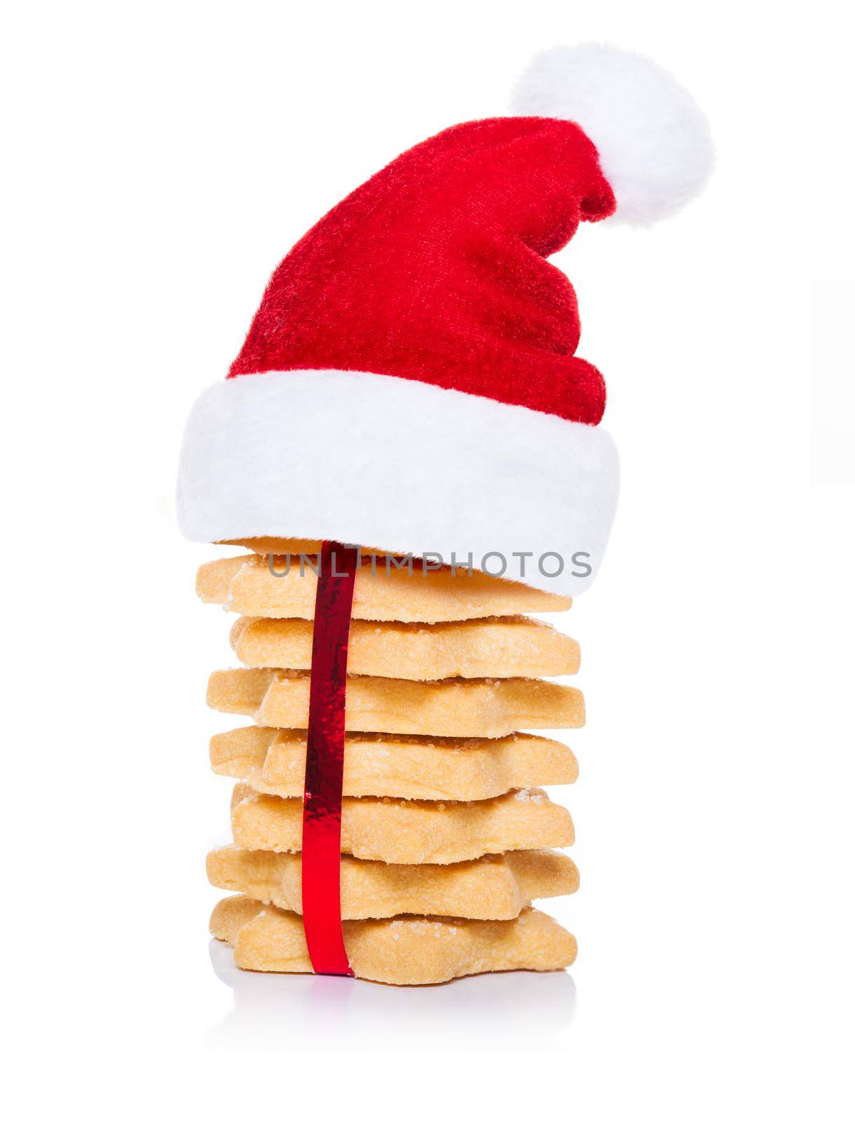 christmas cookies biscuits with santa claus hat, isolated on white background