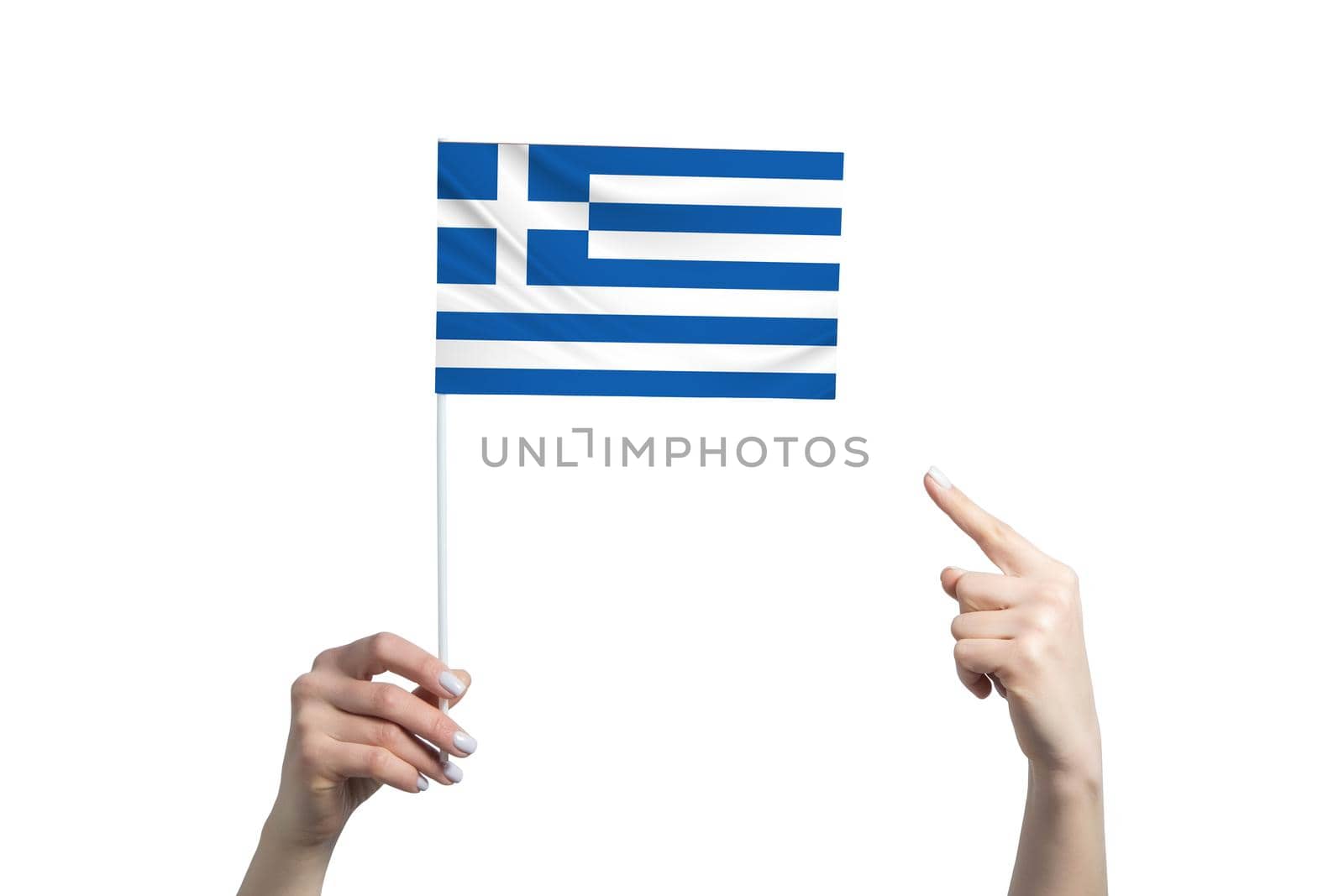 A beautiful female hand holds a Greece flag to which she shows the finger of her other hand, isolated on white background.