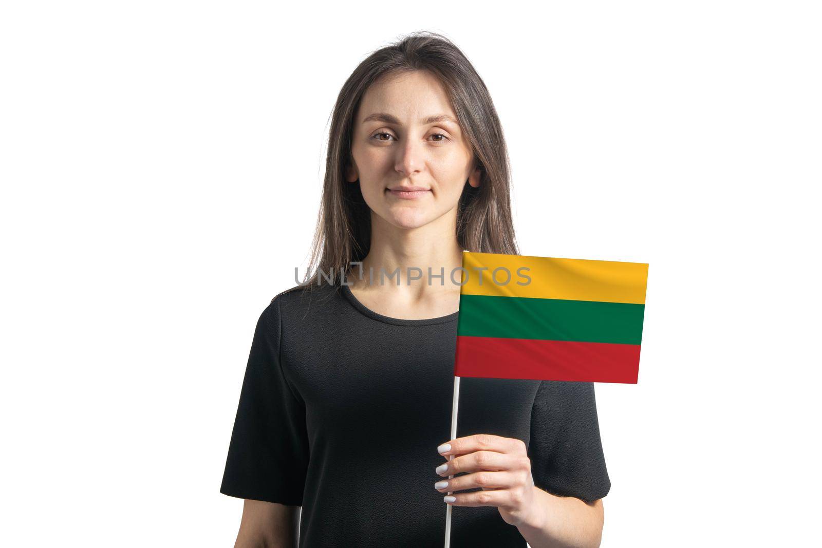Happy young white girl holding Lithuania flag isolated on a white background by uspmen