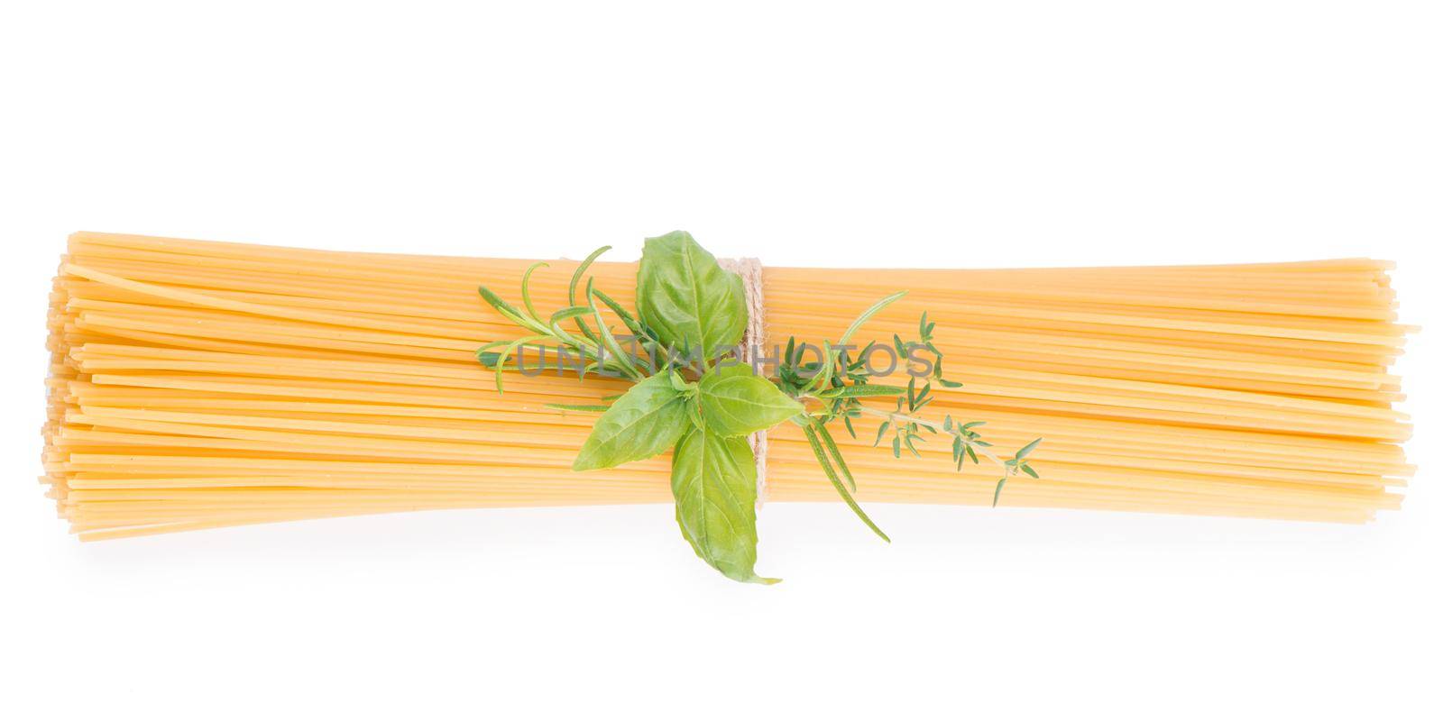 Spaghetti and basil isolated on white background by aprilphoto