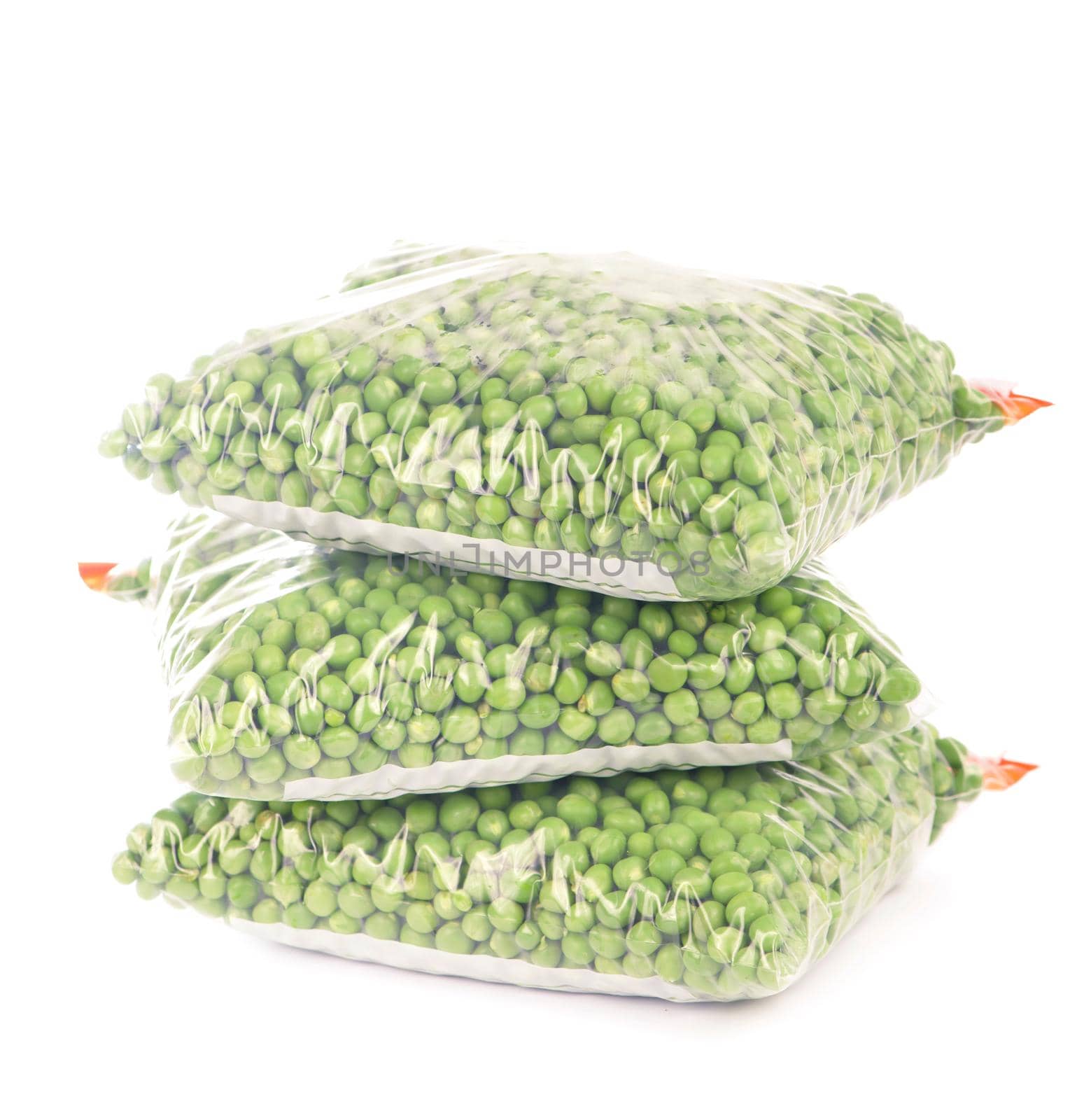 green peas cooked for freezing on a white by aprilphoto