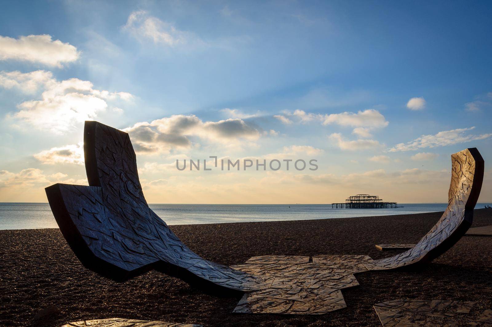 Passacaglia sculpture and the West Pier in Brighton, UK by dutourdumonde