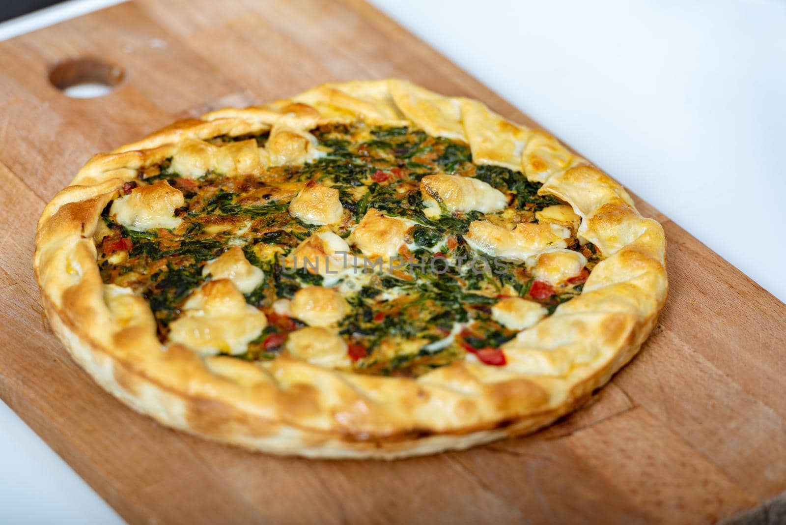 Vegetable Tart, puff pastry, chard, carrot, onion, garlic and red peppers.