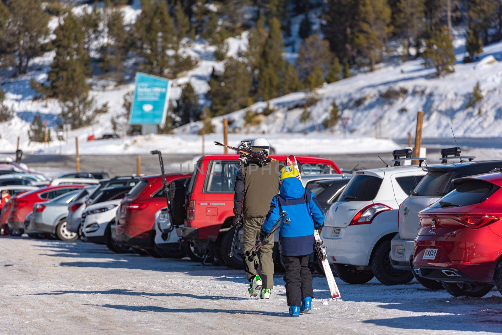 Grandvalira, Andorra: January 2021: People skiing in the parking Grandvalira Pyrenees station in winter 2021