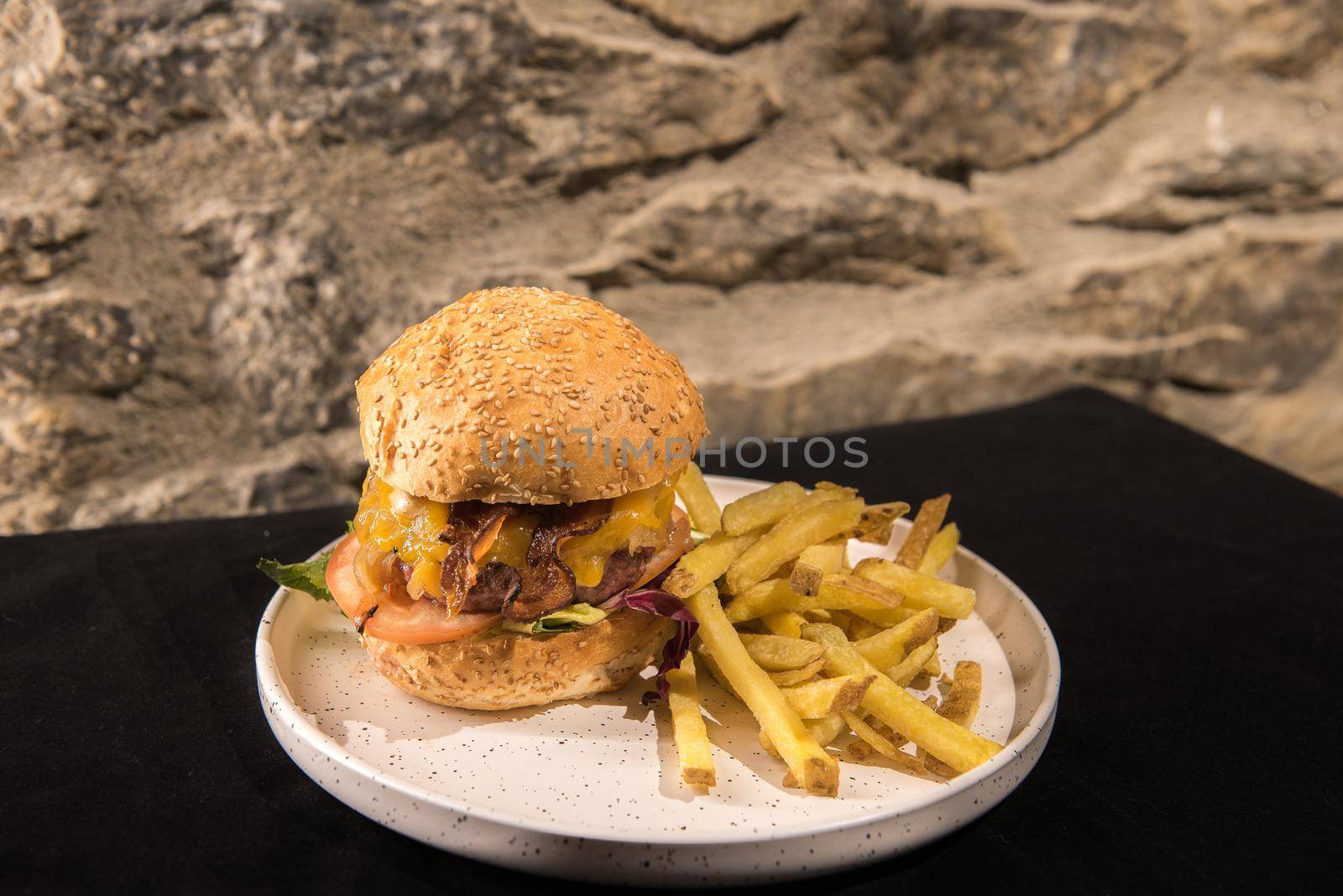Arinsal, Andorra: 2020 December 2: California burger served with French fries.