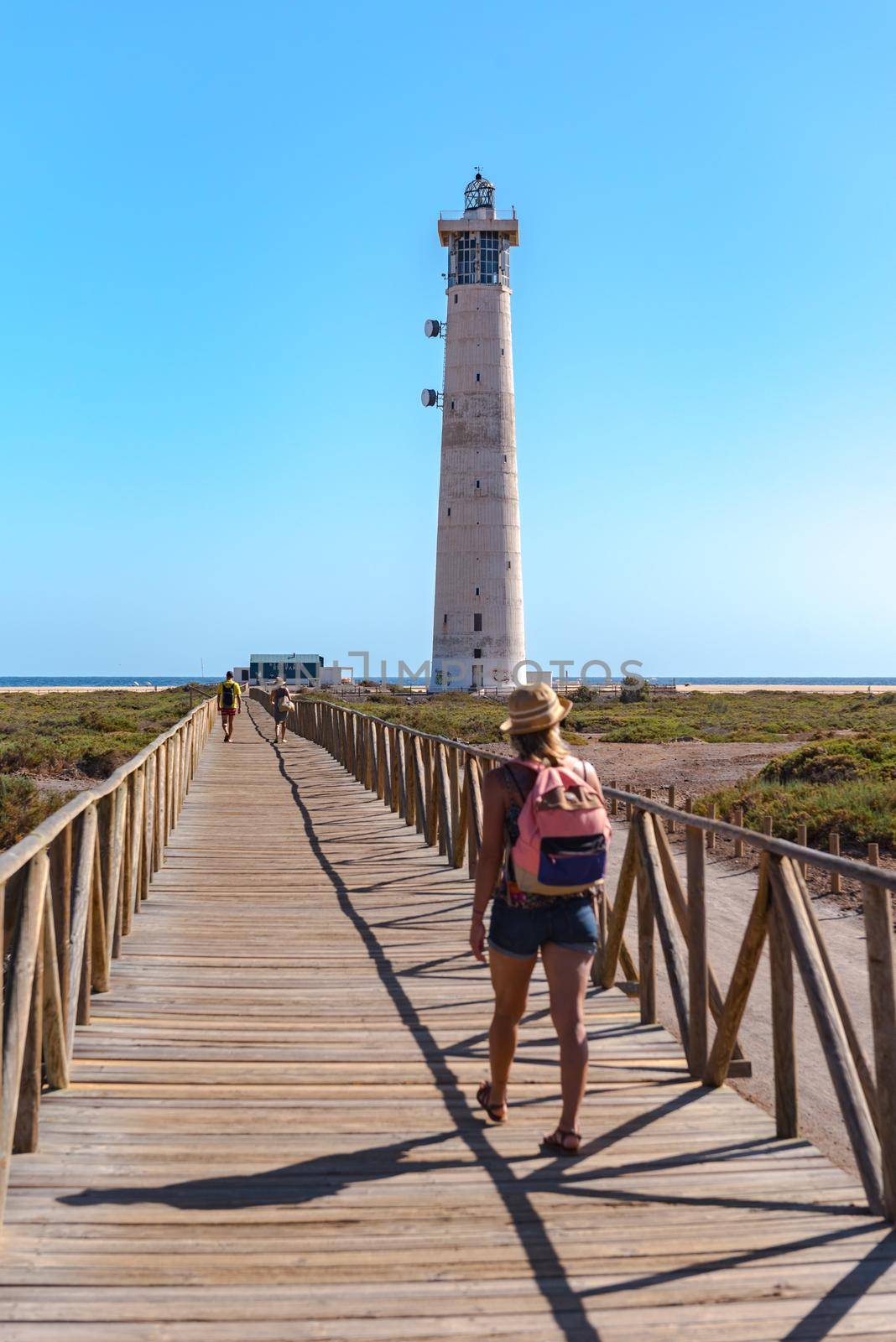 Morro Jable, Fuerteventura, Spain : 2020 October 08 : Gente de camino al faro de Morro Jable en la Isla de Fuerteventura en España en el verano del 2020.