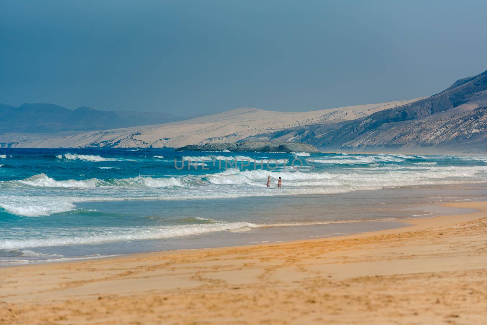 Fuerteventura, Spain : 2020 October 7 : People in the Virgin beaches on the island of Fuerteventura. Cofete beach on the island of Fuerteventura, Spain.
