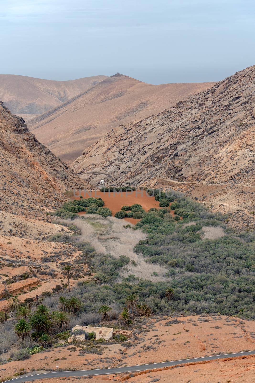 Barranco and Ermita de las Peñitas on the way from Bentacoria to Pajara on the island of Fuerteventura, Spain by martinscphoto