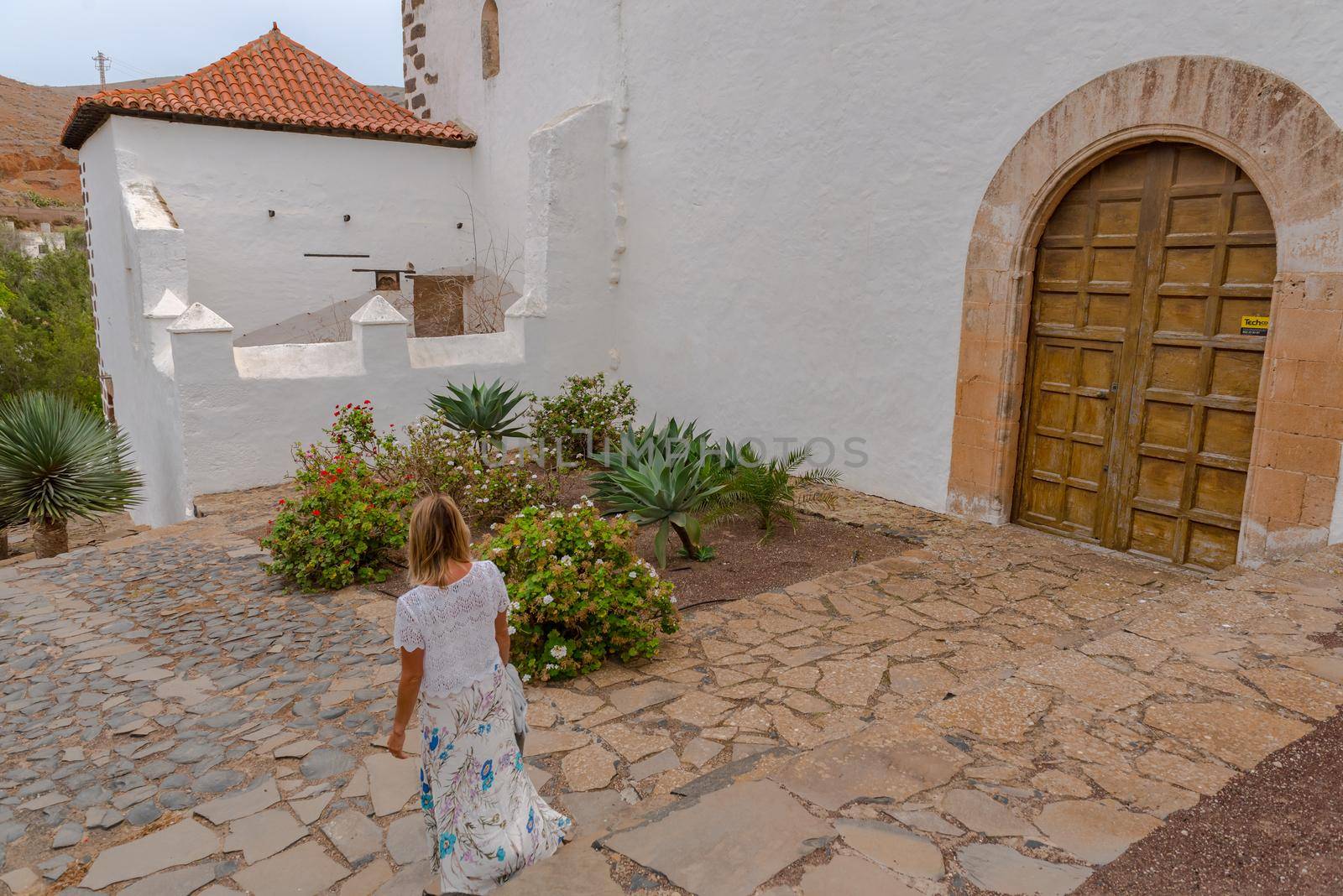 Betancuria, Fuerteventura, Spain : 2020 October 6 :  Young Blonde in Bentancuria on the island of Fuerteventura in Spain in summer.