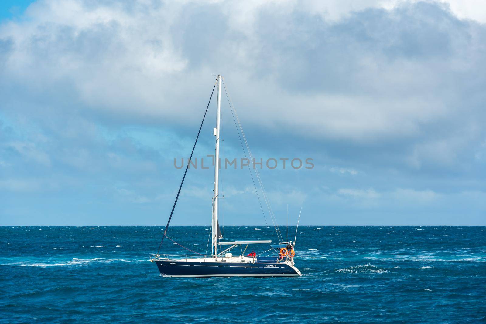 Corralejo, Fuerteventura, Spain: 2020 September 30: Boat in the sea near Corralejo in Fuerteventura in the Canary Islands in Spain.