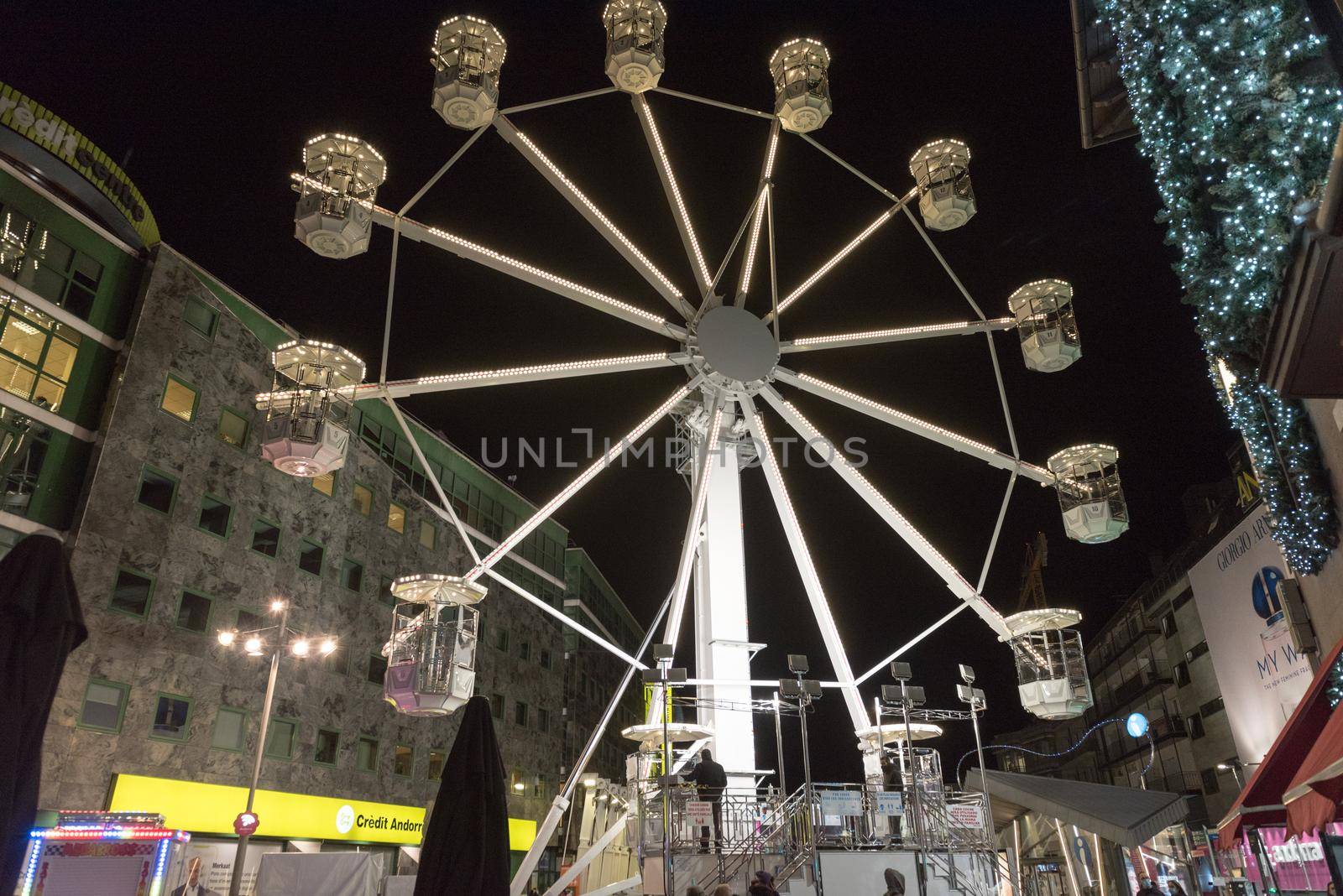 Andorra la Vella, Andorra : 2020 October 30 : Ferris wheel in the City of Andorra La Vella, capital of Andorra in the Pyrenees in autumn 2020.