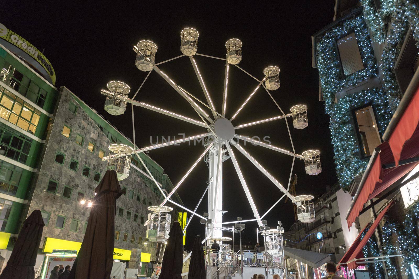 Andorra la Vella, Andorra : 2020 October 30 : Ferris wheel in the City of Andorra La Vella, capital of Andorra in the Pyrenees in autumn 2020.
