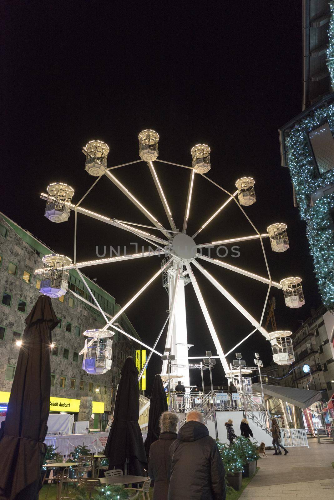 Andorra la Vella, Andorra : 2020 October 30 : Ferris wheel in the City of Andorra La Vella, capital of Andorra in the Pyrenees in autumn 2020.