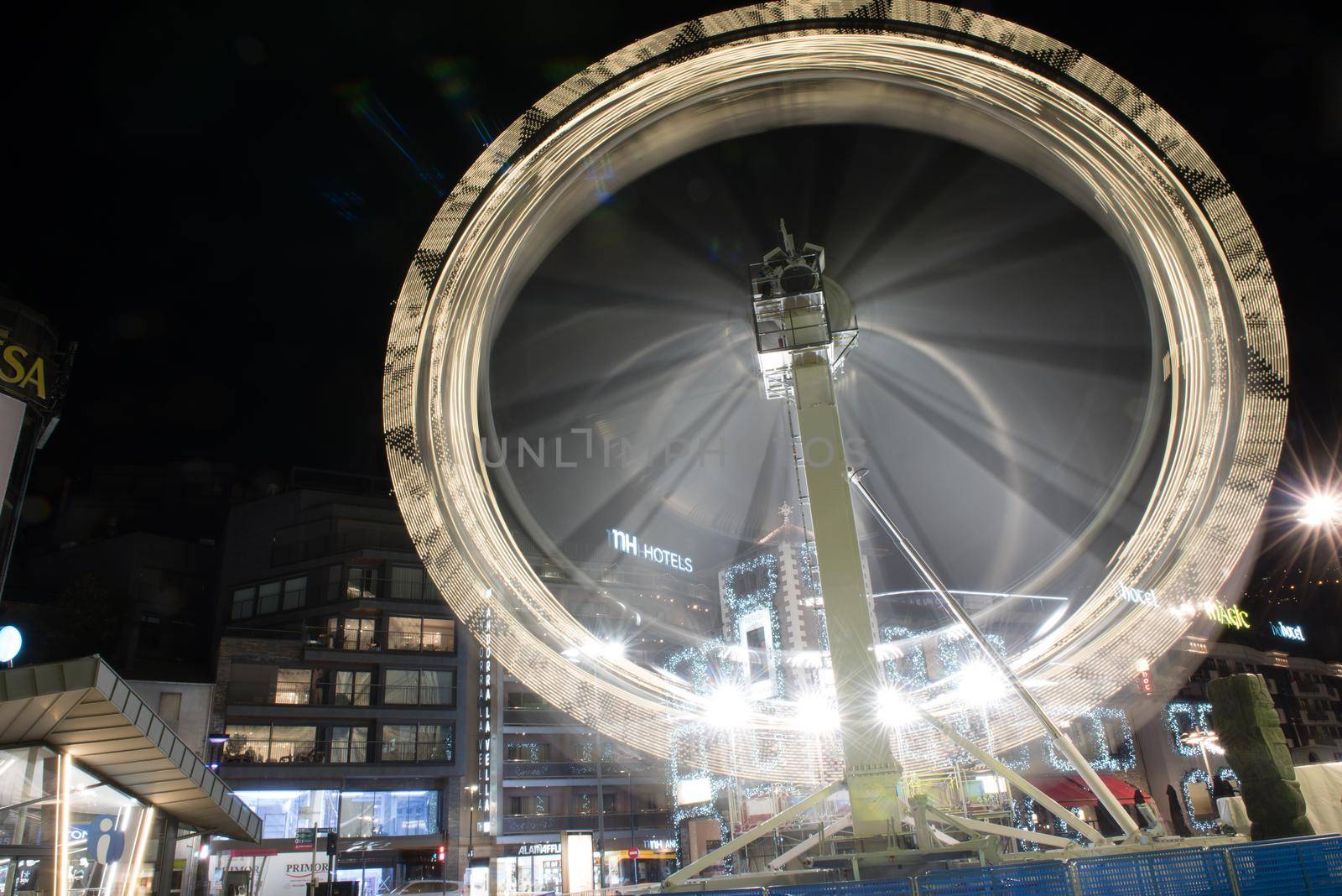 Andorra la Vella, Andorra : 2020 October 30 : Ferris wheel in the City of Andorra La Vella, capital of Andorra in the Pyrenees in autumn 2020.