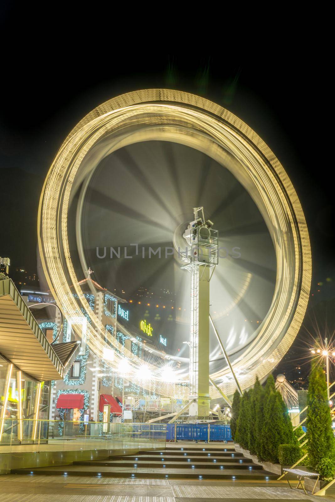 Andorra la Vella, Andorra : 2020 October 30 : Ferris wheel in the City of Andorra La Vella, capital of Andorra in the Pyrenees in autumn 2020.