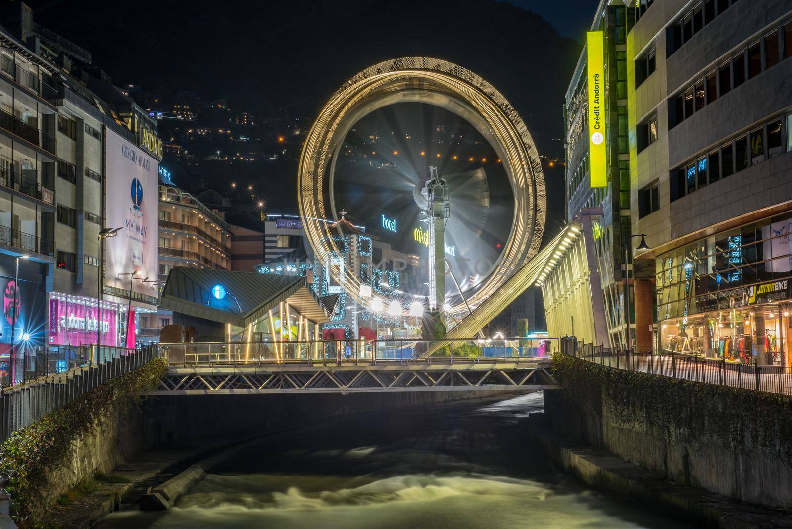 Andorra la Vella, Andorra : 2020 October 30 : Ferris wheel in the City of Andorra La Vella, capital of Andorra in the Pyrenees in autumn 2020.