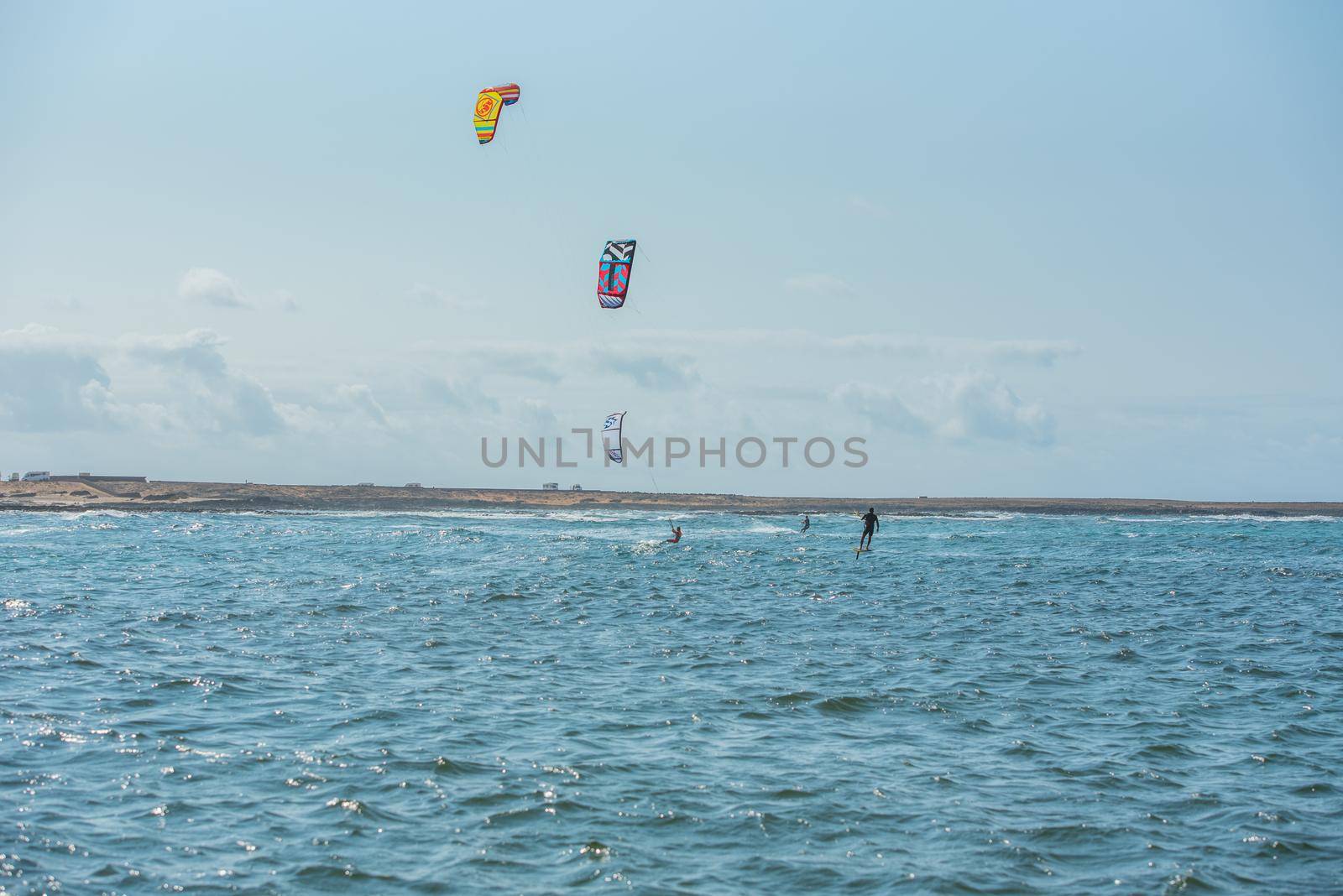 Fuerteventura, Spain : 2020 October 2 : Blonde Woman in the pratic Kite Surf in the Playas de los Charcos in El Cotillo on Fuerteventura in summer 2020.